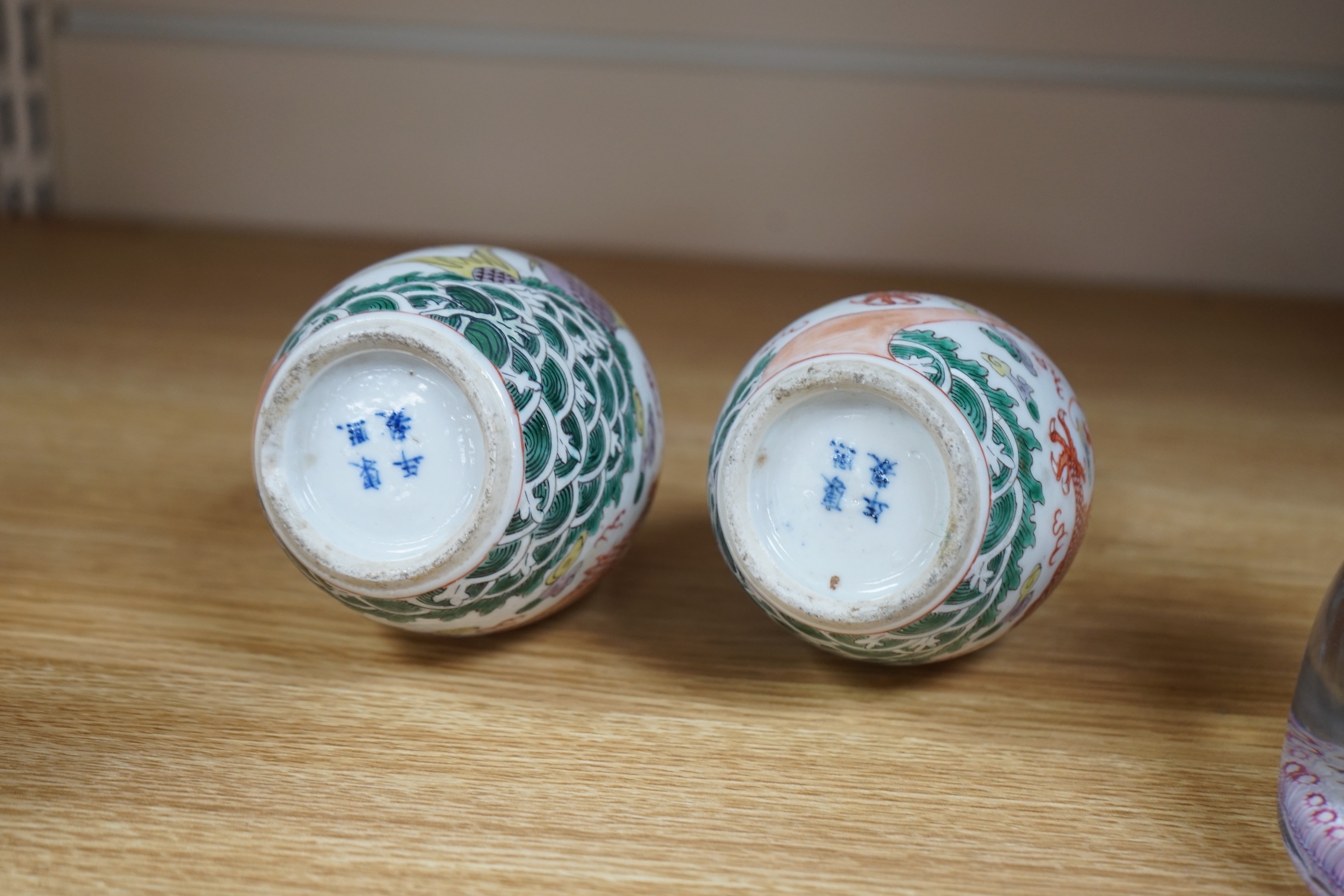 A pair of Chinese enamelled porcelain ‘dragon’ bottle vases, Kangxi marks probably Guangxu period, 15cms high
